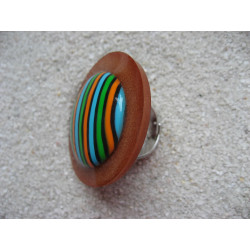 Very large ring, cabochon with multicolored stripes in fimo, on a copper brown resin background