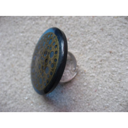 Very large ring, Bronze stamp with holes, on a blue resin background