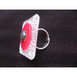 Very large square ring with black pearl on a red and silver background in resin