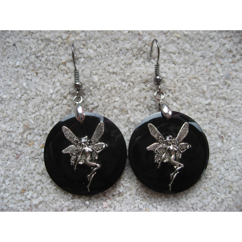 Earrings, winged fairy, on black resin background