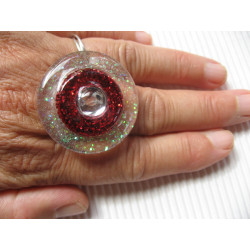 Large ring, white pearl, on a red background and pearly white resin