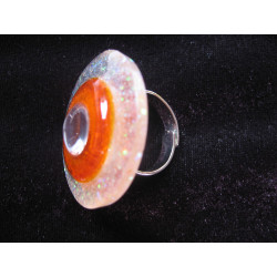 Large ring, white pearl, on a orange background and pearly white resin