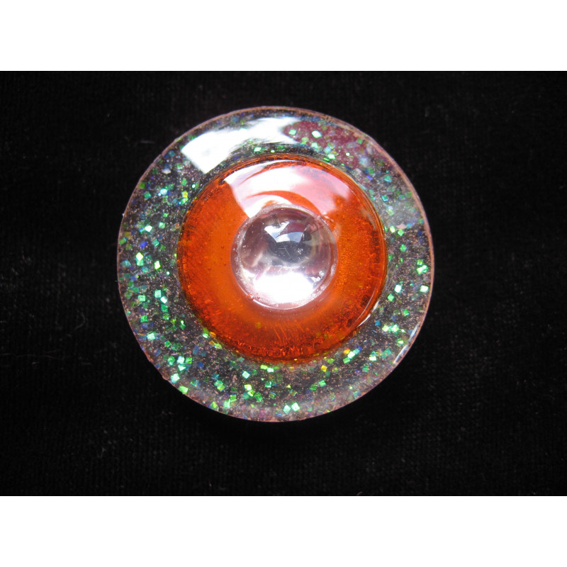 Large ring, white pearl, on a orange background and pearly white resin